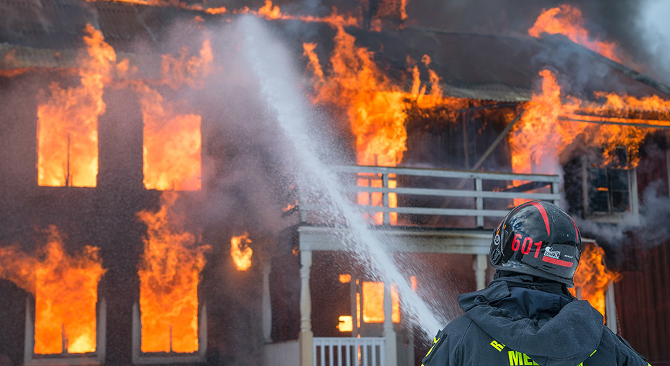 fireman-putting-out-house-fire