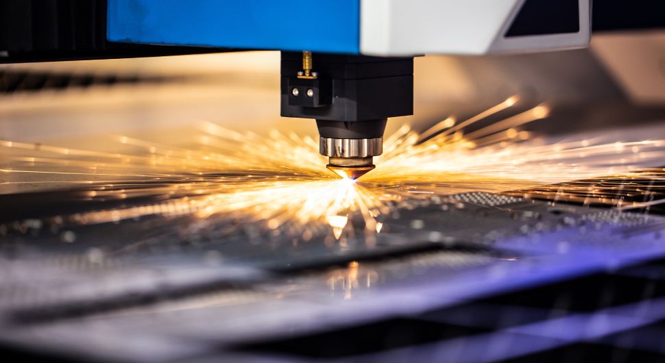 Close up of an industrial wire mesh laser cutting machine.