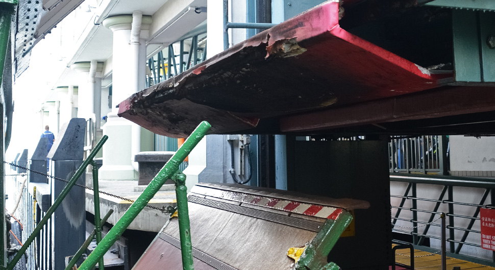 Loading dock and large marine vessel.