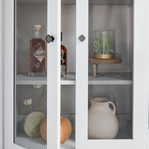 Stainless steel wire mesh cabinet inserts.